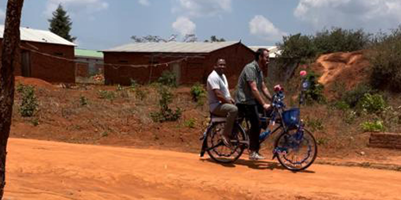 Guys on a bike